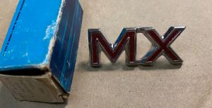 Nameplate Rear Quarter Panel 'MX' Vehicle ID Ornament